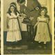Hitler with Joseph Goebbels's daughters, postcard by Heinrich Hoffmann, no date (D0301-04).